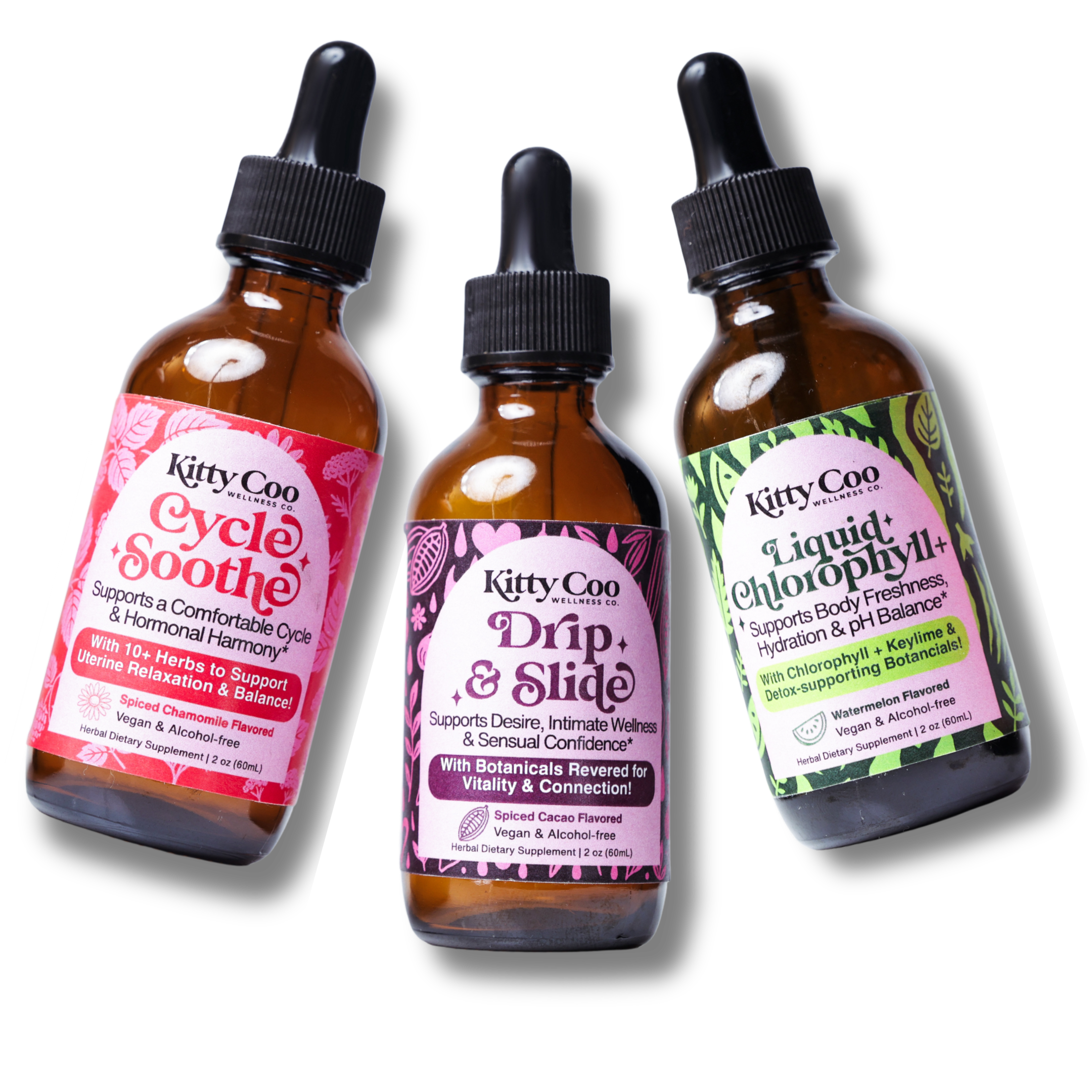 Woman in a bright pink outfit holding small bottles against a pink background